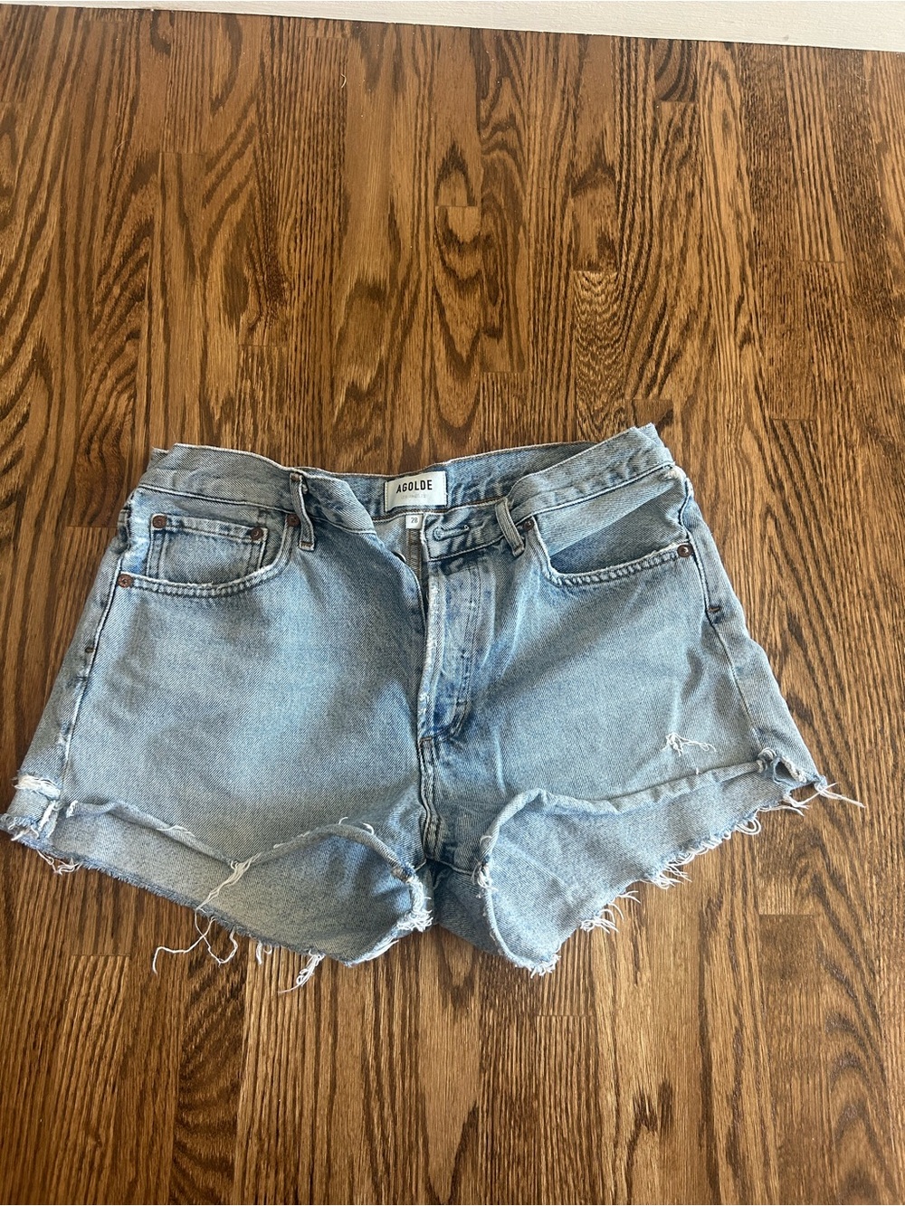 Agolde Light Wash Distressed Denim Cutoff Shorts